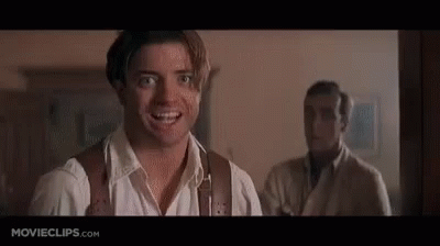 Smiling Man and Man Looking at Camera