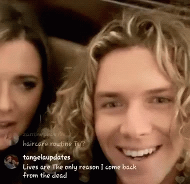 Smiling Man And Woman With Tangelaupdates GIF