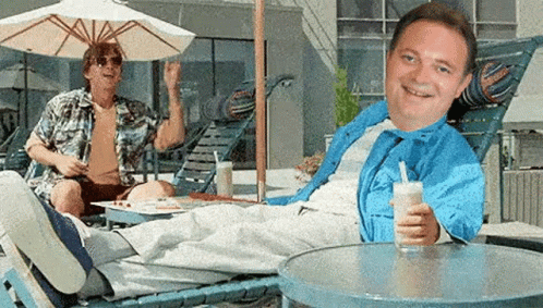Smiling Man Holding Drink, Man Standing Behind
