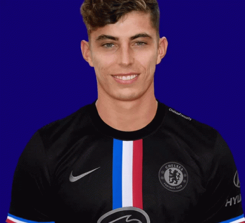 Smiling Man in Black Shirt With Red White Blue Stripe