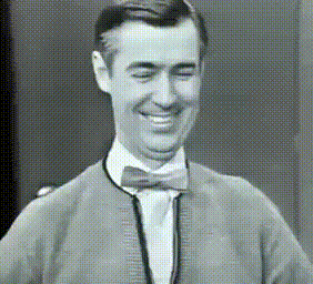 Smiling Man in Bow Tie and Sweater