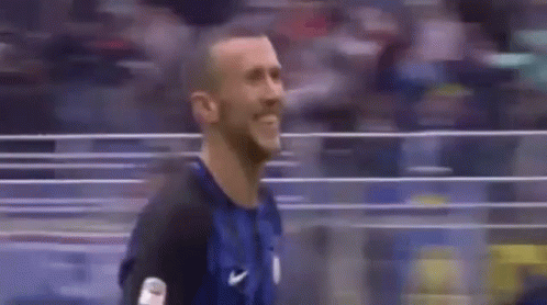 Smiling Man in Soccer Uniform