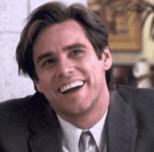 Smiling Man in Suit and Tie