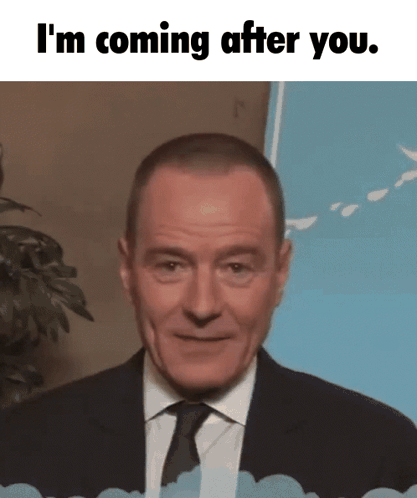 Smiling Man in Suit I'm Coming After You