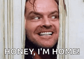 Smiling Man Looking Through Door Honey I'm Home