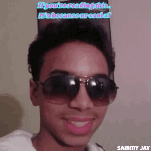 Smiling Man Wearing Sunglasses Says You're Cool
