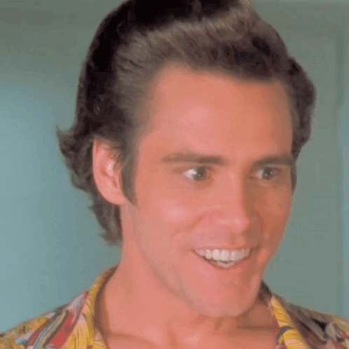 Smiling Man with Bun
