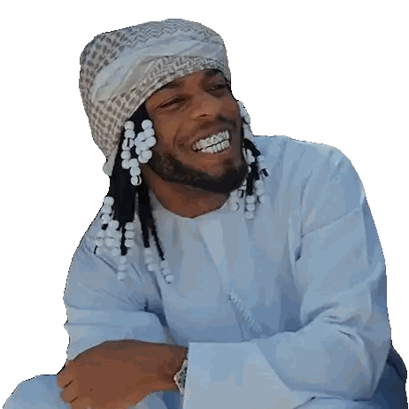 Smiling Man With Dreadlocks and Scarf