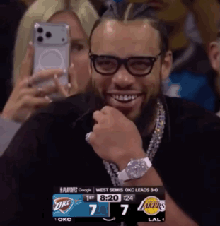 Smiling Man With Glasses And OKC Scoreboard GIF