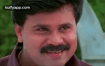 Smiling Man with Mustache