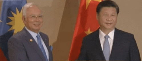 Smiling Men in Suits and Ties