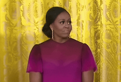 Smiling Michelle Obama GIF