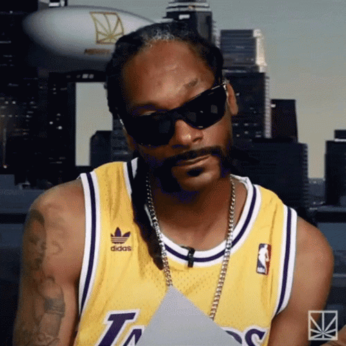 Smiling Snoop Dogg Laugh GIF