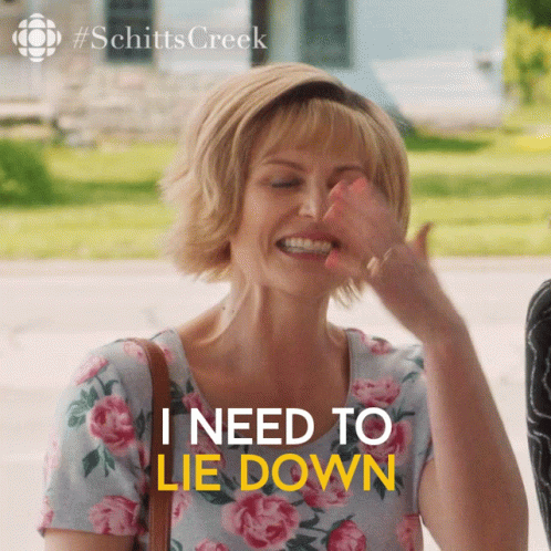Smiling Woman Floral Shirt I Need Lie Down