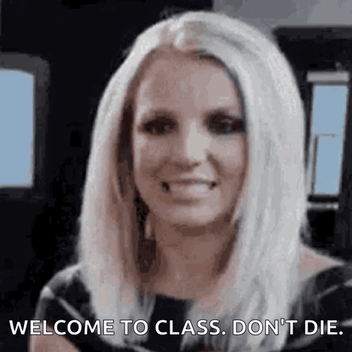 Smiling Woman Saying Welcome to Class