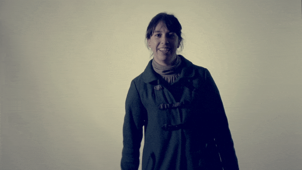 Smiling Young Girl Tossing Yoyo GIF