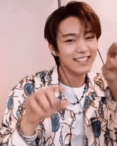 Smiling Young Man Holding Ring