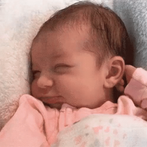 Smirk Baby Girl GIF