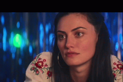 Smirking Phoebe Tonkin GIF