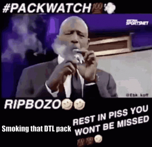 Smoking Man In Suit Talking Into Microphone GIF