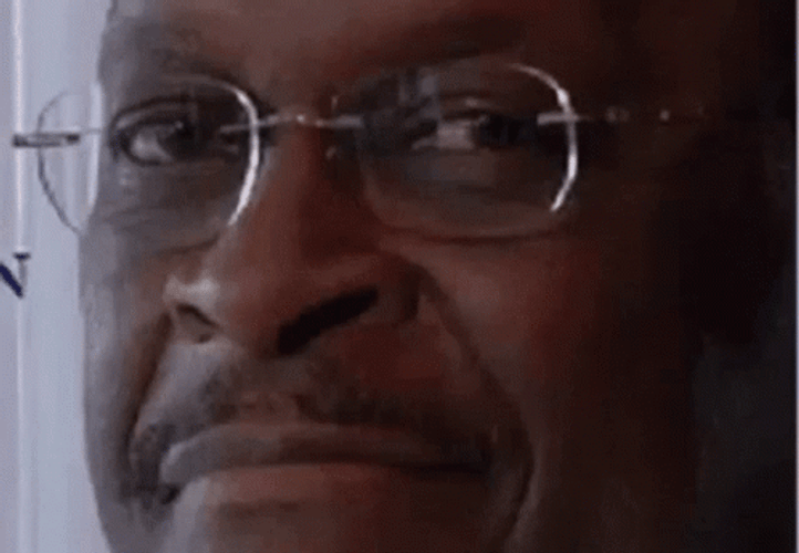 Smug Herman Cain Smiling GIF