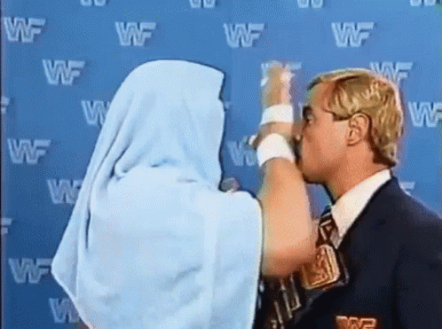 Smug Randy Savage Erasing The Face GIF