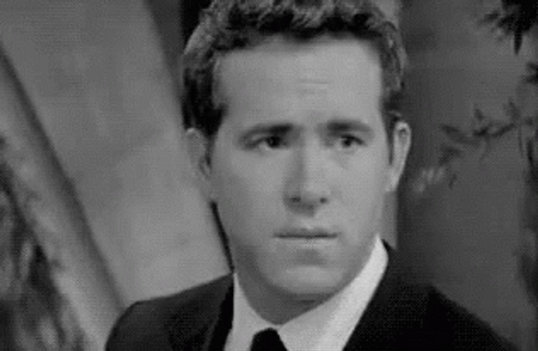 Smug Ryan Reynolds GIF