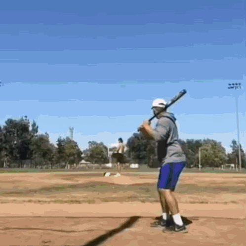 Smurf Cat Man Failing To Hit Baseball GIF