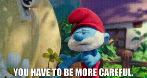 Smurf Holding Flower Says You Have To Be More Careful GIF