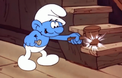 Smurf Holding Wooden Hammer in Front of Stairs
