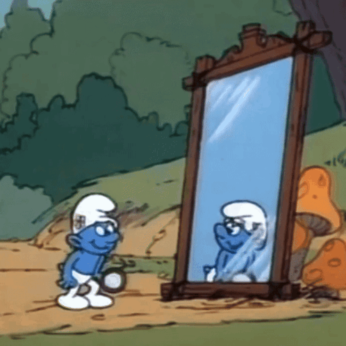 Smurf Looking At His Reflection In A Mirror GIF