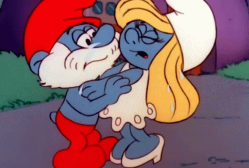 Smurf With Beard Hugging Smurf in White Dress