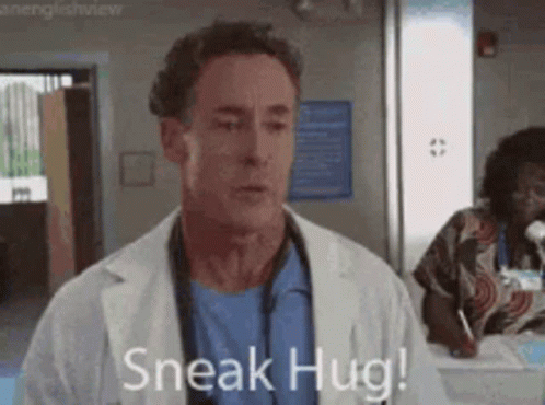 Sneak Hug Doctors Funny Hug GIF