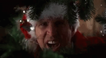 Sneaky Clark Griswold Christmas Tree Peek GIF