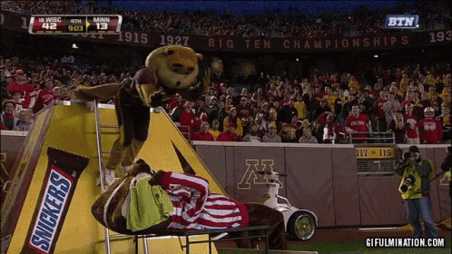 Snickers Bar Mascot on Football Field
