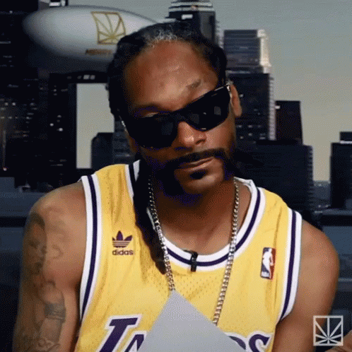 Smiling Snoop Dogg Laugh GIF