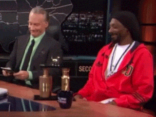 Snoop Dogg Awkward Hand Shake With Host GIF