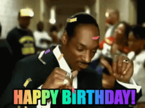Snoop Dogg Celebrating Birthday With Rainbow Confetti