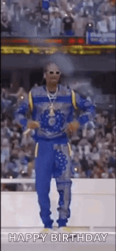 Snoop Dogg Dancing in Blue and Yellow Jersey