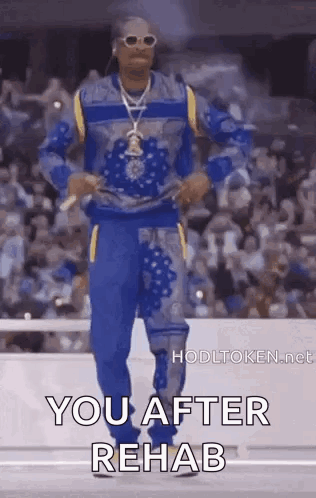 Snoop Dogg Dancing in Blue Sweater and Sweatpants