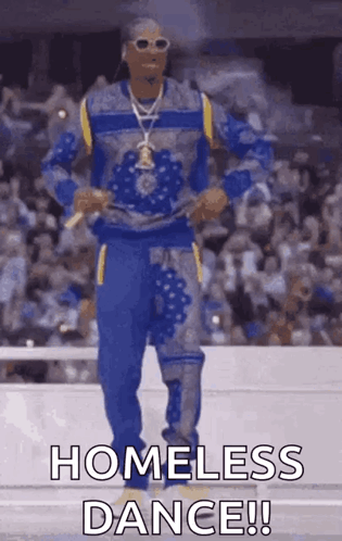 Snoop Dogg Is Dancing In Front Of A Crowd While Wearing A Blue And Yellow Outfit . GIF