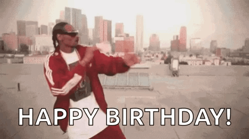 Snoop Dogg Is Dancing On A Rooftop With The Words `` Happy Birthday '' Written Below Him . GIF