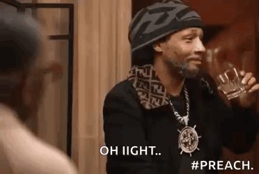 Snoop Dogg Is Drinking A Glass Of Whiskey And Talking To Someone . GIF
