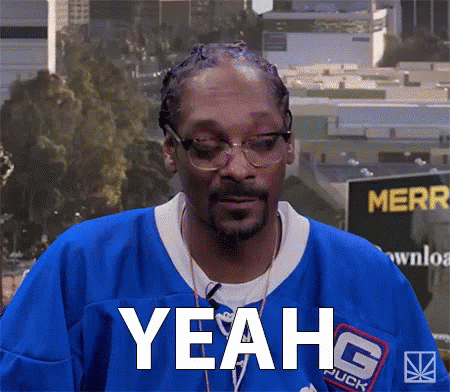 Snoop Dogg Is Wearing A Blue Jersey And Says Yeah GIF
