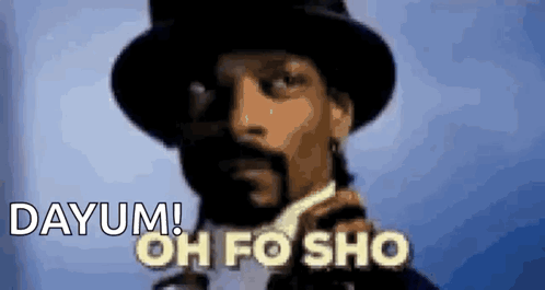 Snoop Dogg Is Wearing A Top Hat And A Suit And Tie And Says Dayum ! Oh Fo Sho . GIF