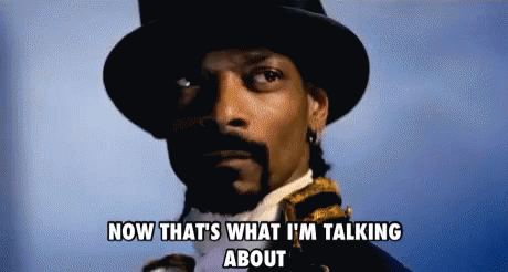 Snoop Dogg Is Wearing A Top Hat And Tie And Says Now That 'S What I 'M Talking About GIF