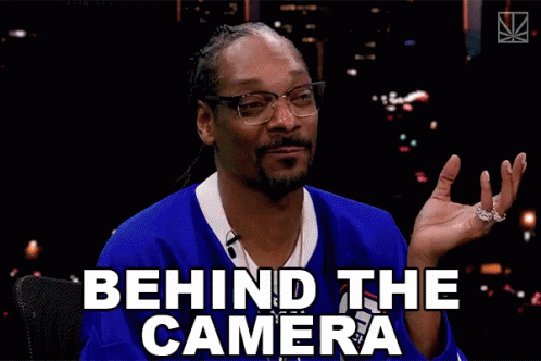 Snoop Dogg Says Behind The Camera While Wearing Glasses GIF