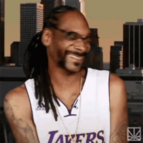 Snoop Dogg Smiling in Lakers Jersey