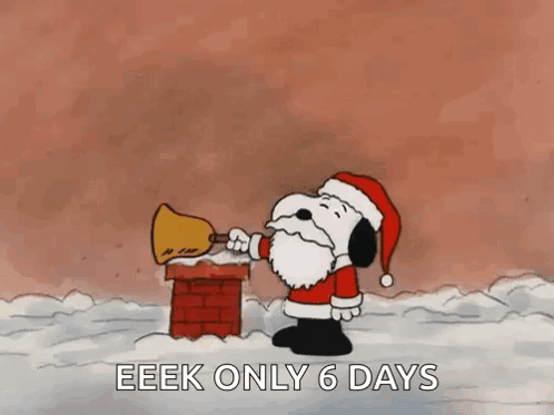 Snoopy Dressed as Santa Holding Bell