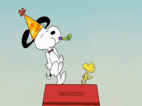 Snoopy In Party Hat Standing On Trendizisst Box GIF